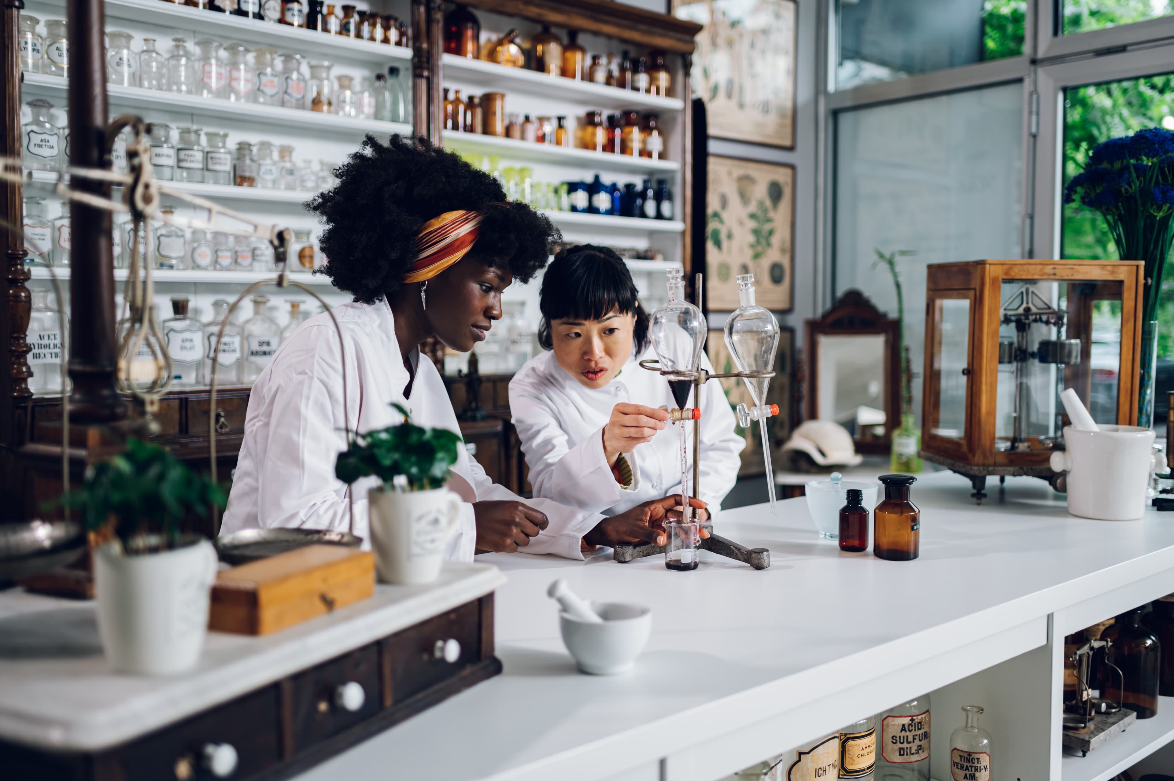 Research laboratory with botanical specimens and analysis equipment